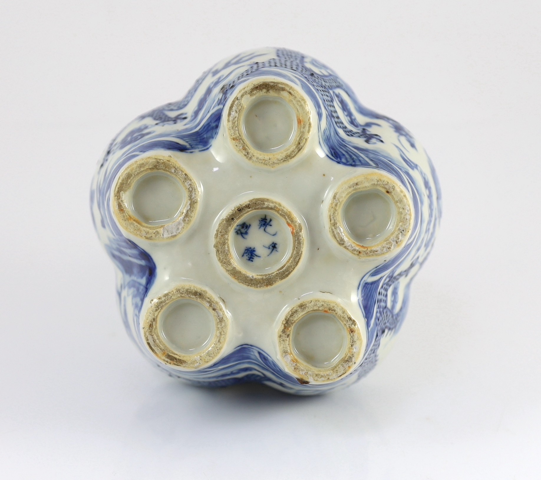 A Chinese blue and white ’dragon’ tulip vase, 19th century, 25cm high, splinter chips